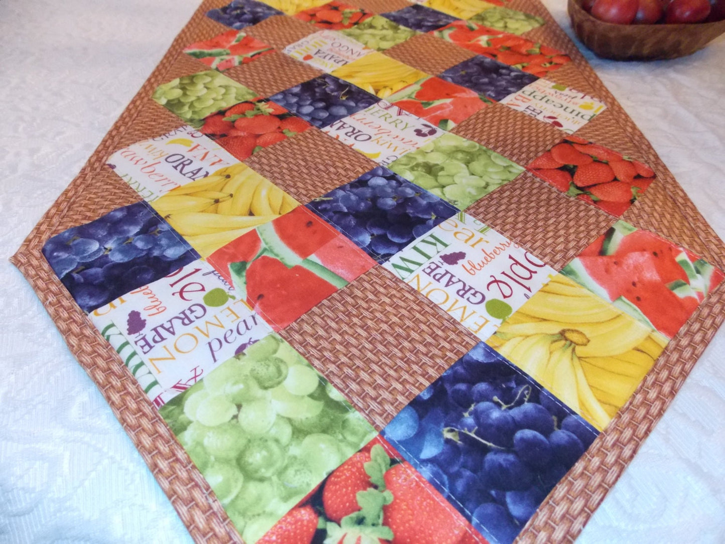 Table Runner Quilt, Table Topper Centerpiece, Fruit Quilt, Grape, Strawberry, Blueberry, Banana, Watermelon, brown, tan, red, green, yellow.